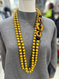 Collar de bolas en color amarillo